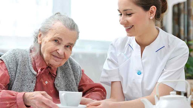 elderly woman with nurse